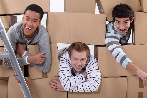 Office relocation items loaded carefully into a van