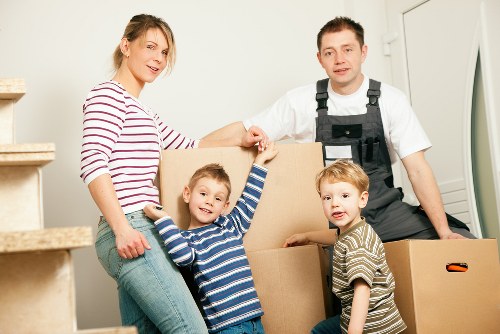 Team planning a furniture pick-up job in a Gipsy Hill residential street