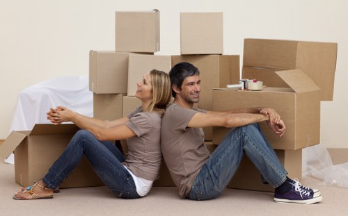 Unpacking household items into a new home in Gipsy Hill