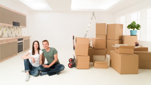 Furniture being loaded into a removals van for a local move