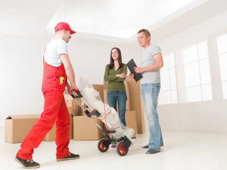 Furniture being carefully loaded for transport during a local move