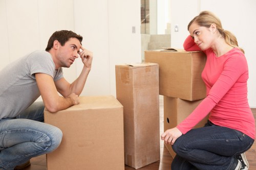 Loading household furniture into a van near Gipsy Hill