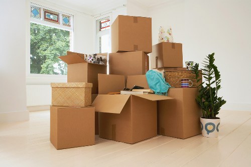Packed boxes and furniture ready for transport in Gipsy Hill