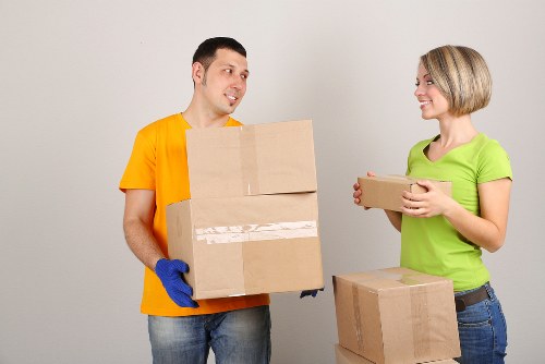 Loading household items into a removals van for a South London move